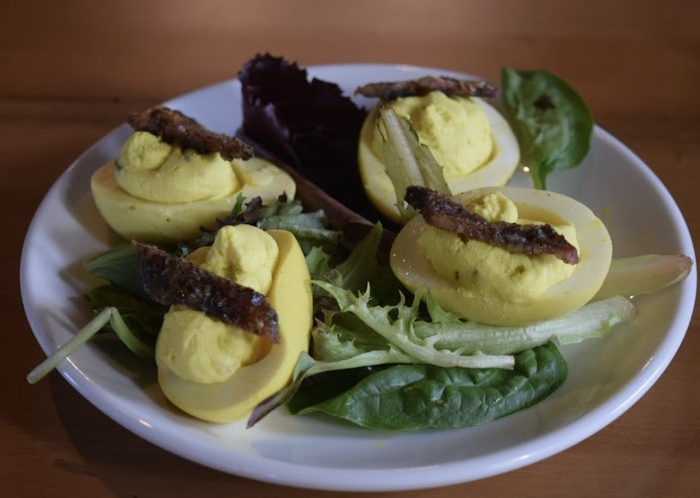 Outpost Neighborhood Tavern signature dishes Deviled EggsWhipped FetaThe Big Catch